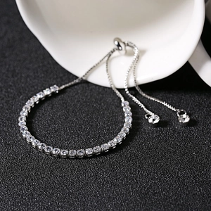3mm silver zircon bracelet with adjustable slider clasp on a minimalist background