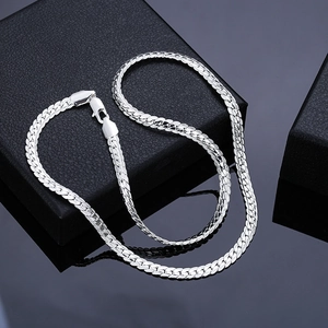 Polished silver flat curb chain necklace with lobster clasp on premium black display box
