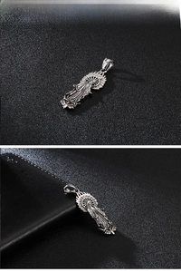 Detailed close-up of Virgin Mary religious pendant with sparkling crystal inlay