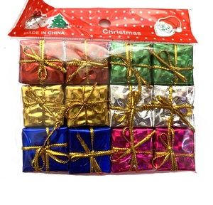 Detailed view of 12 mixed-color Christmas foam gift boxes with shiny laser foil finish