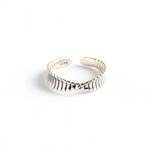 Vintage S925 sterling silver twist open ring with wave texture on white background