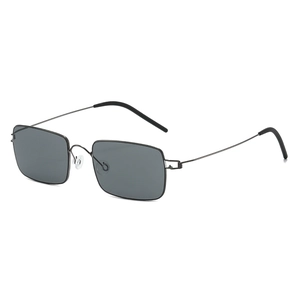 Ultralight retro rectangular sunglasses with thin black metal frames and dark gray lenses