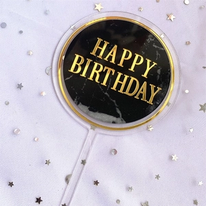 Acrylic Happy Birthday cake topper with gold marble design for party celebration decor.