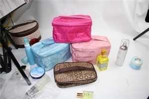 Detail view of large capacity Songes letter pattern toiletry bags in various colors