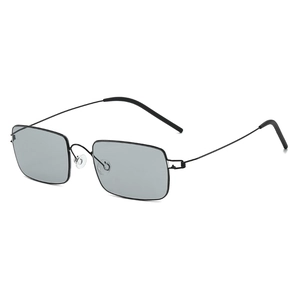 Ultralight screwless rectangular black metal sunglasses with light gray lenses from 45-degree angle