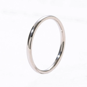 Minimalist silver polished stainless steel ring with a smooth mirror finish and slim design
