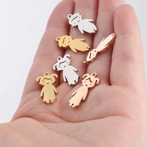 Polished stainless steel boy and girl pendants in silver, gold, and rose gold finishes