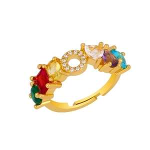 Detail of adjustable gold ring with multi-colored cubic zirconia stones in micro-pave setting