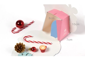 Detailed view of pink and blue Christmas gift box with 10x8x7cm size markings