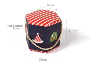 Detailed view of striped hexagonal Christmas gift box with 10cm height and 32cm rope handle