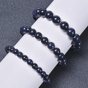 Blue goldstone beaded bracelet featuring sparkling galaxy stars effect in multiple sizes
