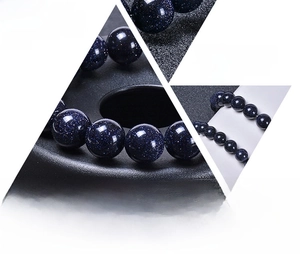 Macro detail of natural blue sand stone bracelet showing starlight texture and beads