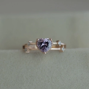 Rose gold plated ring with heart shaped amethyst and delicate diamond accents on band