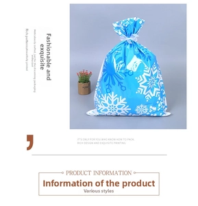 Blue snowflake gift bag with white ribbon drawstring for festive holiday packaging