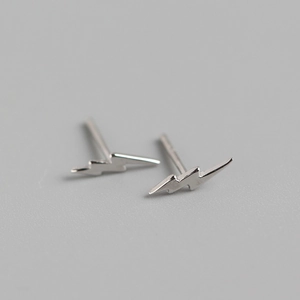 Minimalist S925 sterling silver lightning bolt stud earrings with a polished finish