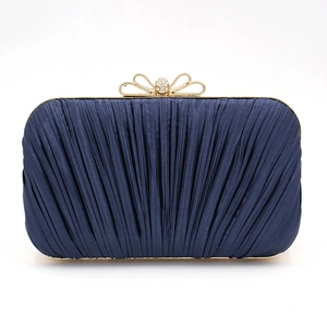 Pleated navy blue satin evening clutch bag with a rhinestone bow metal clasp