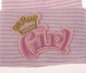 Detailed knit texture of pink and white striped baby hat with crown girl embroidery