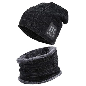 Detail of winter knitted beanie and neck warmer set with soft fleece lining and NC patch