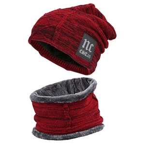 Detail of red and black knit hat and neck warmer with plush lining and NC logo