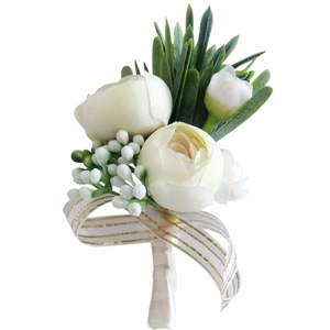 Artificial white peony wedding boutonniere with green leaves and gold-striped ribbon bow