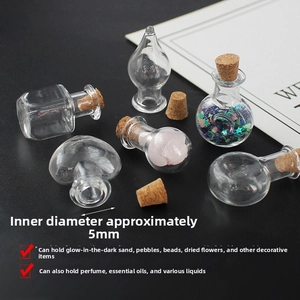 Detailed macro view of assorted mini glass bottles with 5mm mouth and cork stoppers