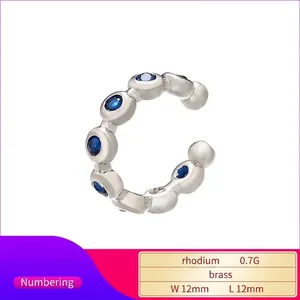 Rhodium plated brass C-shaped ear cuff with blue cubic zirconia stones, size 12x12mm