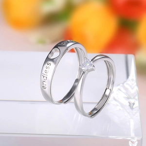 Adjustable silver couple rings with endless love engraving and heart zircon stone