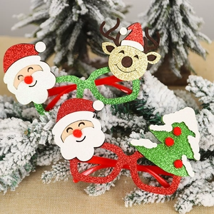 Festive Christmas glasses with Santa, reindeer and snow tree decor for holiday parties