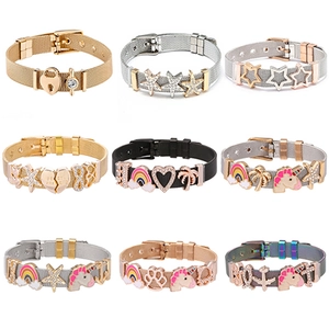 Detail view of colorful mesh bracelets with DIY enamel charms in multiple finishes