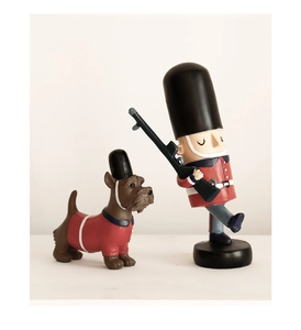 Detail of creative British royal guard and Scottish terrier resin figurine set