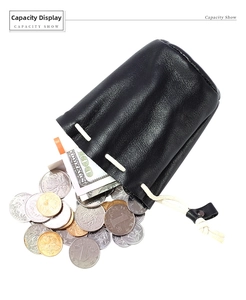 Capacity display of black leather drawstring coin pouch with coins and bills