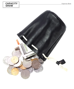 Compact oil wax leather coin pouch showing high capacity for bills and coins