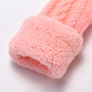 Pink chunky cable knit winter mittens with soft plush fleece cuffs for cold weather