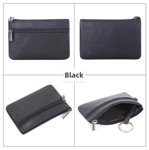 Detail view of black crazy horse leather coin purse with zipper and metal key ring