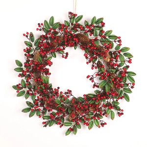 Ghirlanda natalizia artificiale con bacche rosse e pigne per decorazione festiva