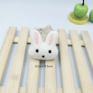 Close-up of a white plush rabbit charm showing 4.5cm dimensions for DIY accessory