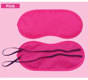 Detailed view of both sides of a hot pink blackout sleep mask with dual elastic straps