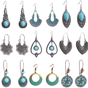 Detail view of 9-pair bohemian earrings set featuring turquoise beads and vintage metal