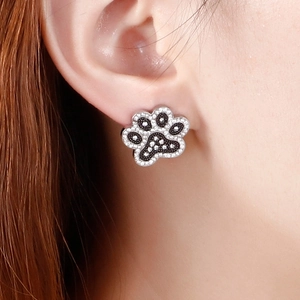 Cute stainless steel animal paw print stud earrings with black and white rhinestones