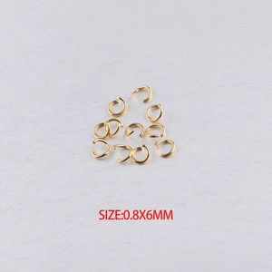 Detailed view of 0.8x6mm gold stainless steel open jump rings for DIY jewelry making