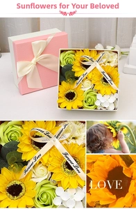 Detail of soap flower gift box with yellow sunflowers and pink ribbon bow decoration