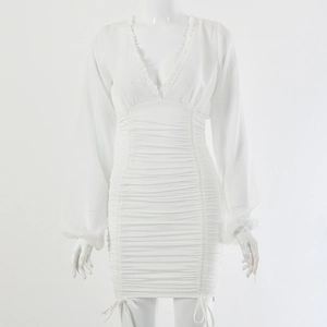 Detail view of white long sleeve dress with V-neckline and elegant drawstring ruffles