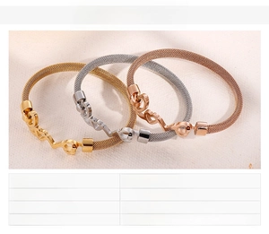 Detailed view of woven mesh love bracelets in gold, rose gold, and silver stainless steel