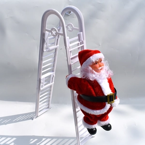 Detail showing an electric Santa Claus figure climbing a white ladder for Christmas