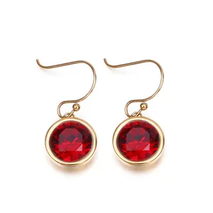 Elegant gold-plated hook earrings with round red cubic zirconia crystals and polished metal finish