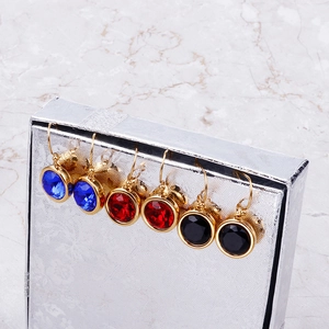 Golden stainless steel drop earrings set with colorful round cubic zirconia crystals