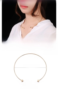 Detail of gold stainless steel choker featuring square zircon studs and dimensions