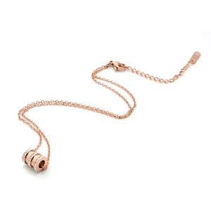Elegant rose gold triple ring cylinder pendant necklace with sparkling crystal accents
