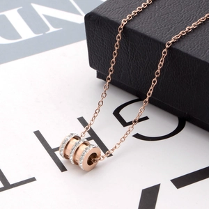Rose gold titanium steel necklace with a triple-ring cylinder diamond pendant for women