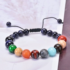 Detail of double-layer adjustable bracelet with natural stones and blue sandstone beads